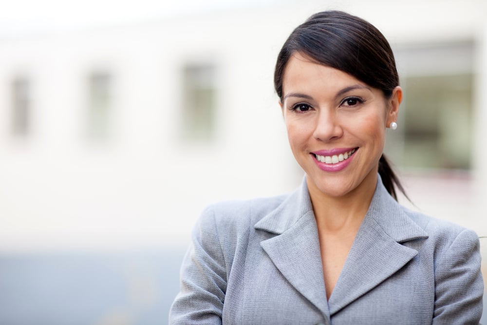 Portrait of a business woman looking happy and smiling
